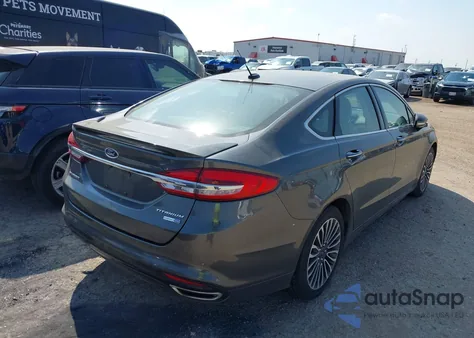 2018 Ford Fusion Titanium z USA, uszkodzony, nr VIN 3FA6P0D94JR124682